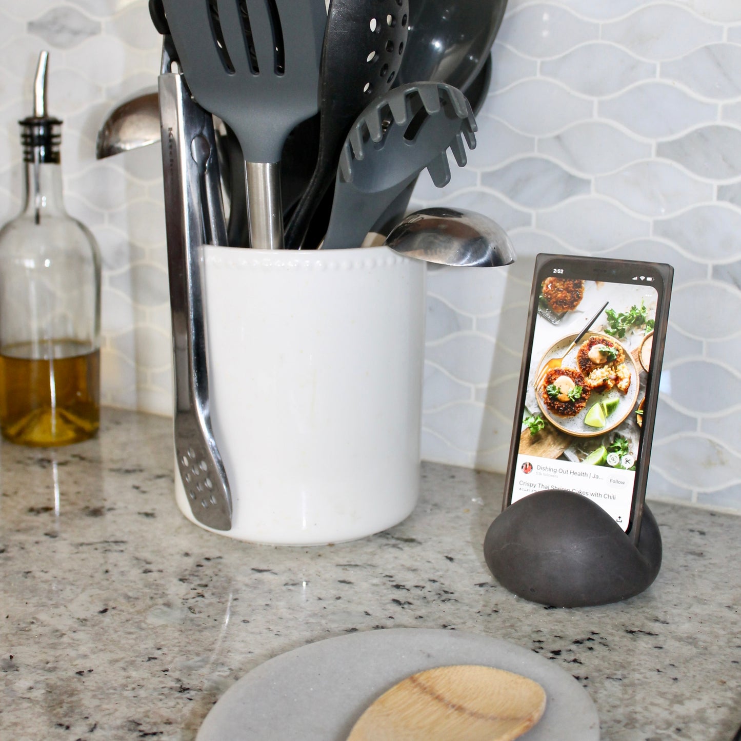 concrete phone holder for reading recipes in the kitchen