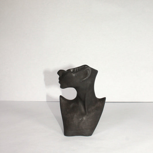 Black concrete woman silhouette on a white background