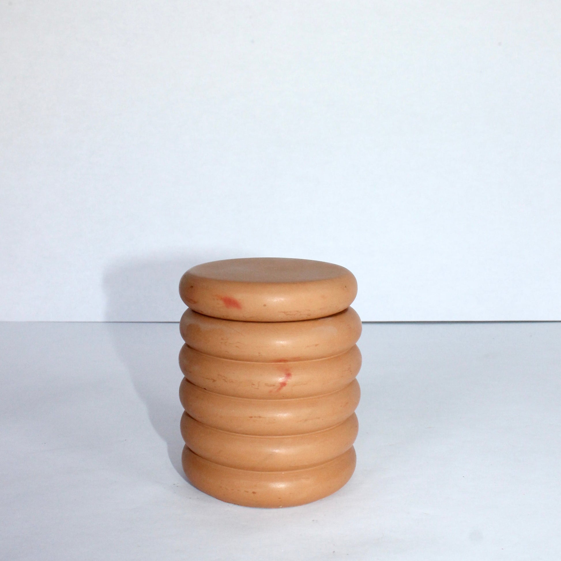 terracotta concrete bubble jar on a white background