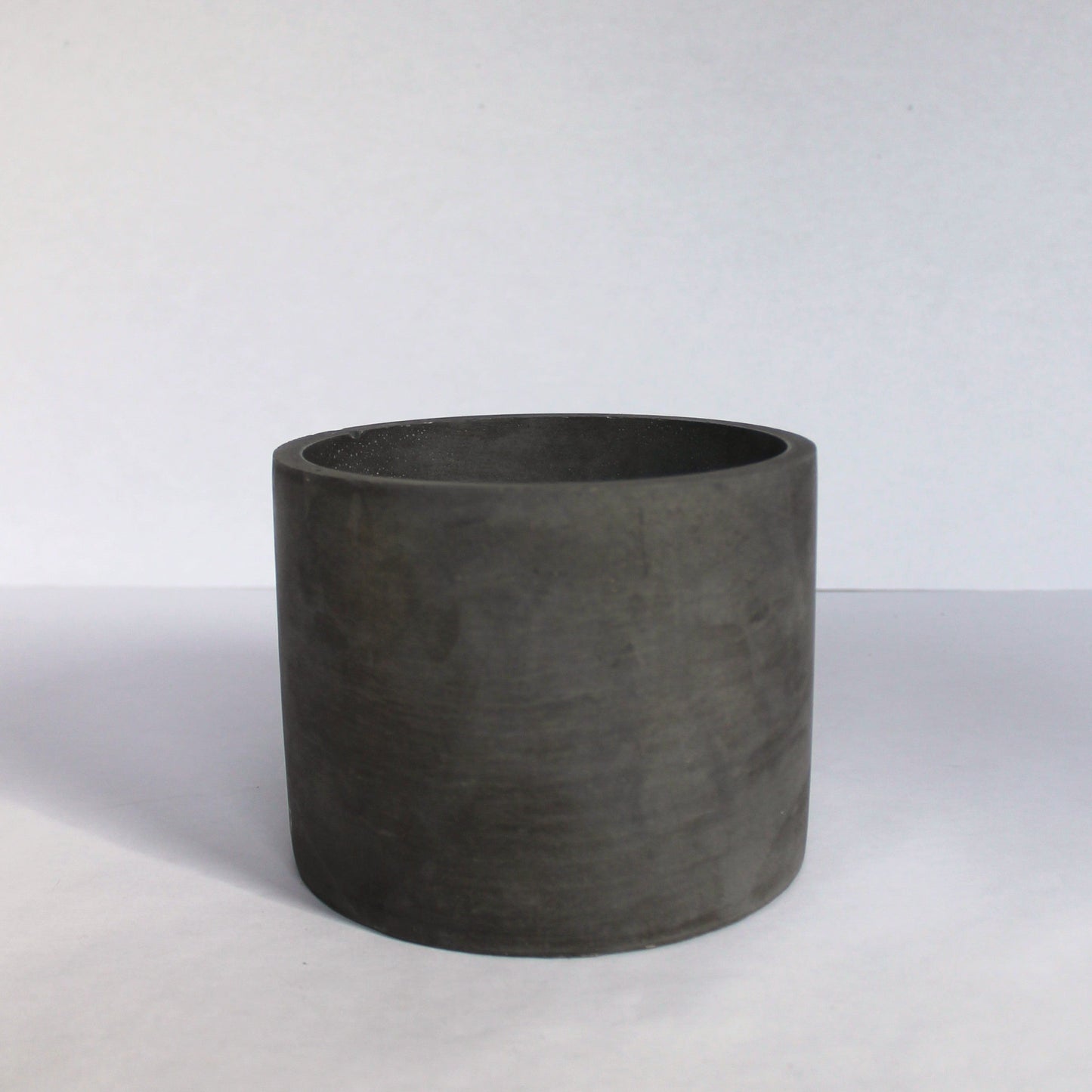 Dark Gray cylindrical pot on a white background