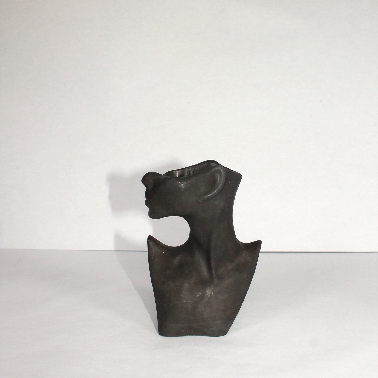 Black concrete woman silhouette on a white background