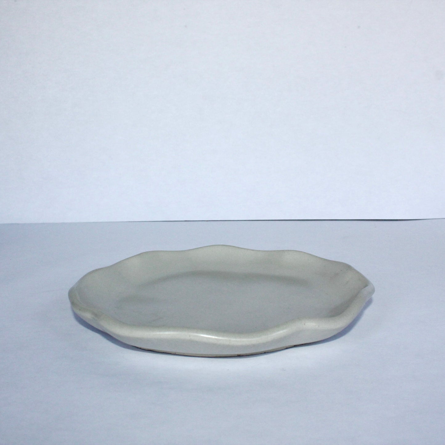 gray concrete plate on a white background