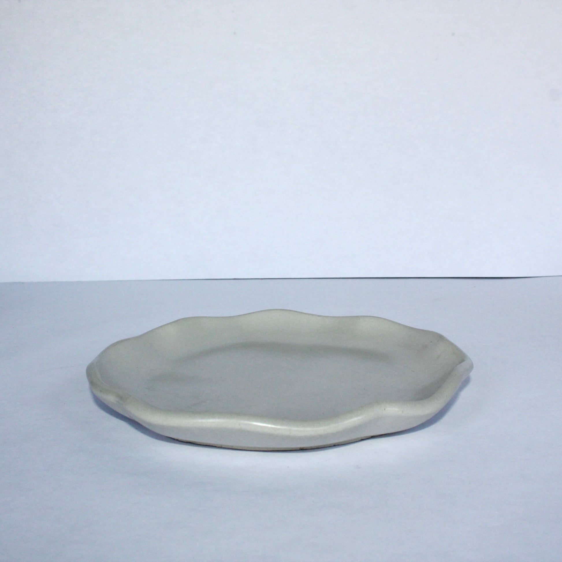 gray concrete plate on a white background